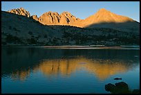 Palissades and Columbine Peak reflected in lake at sunset. Kings Canyon National Park, California, USA. (color)