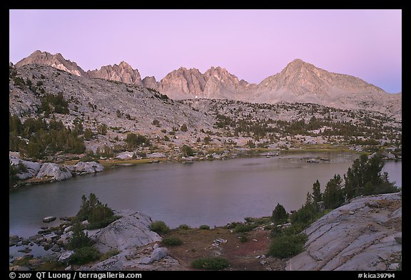 Columbine Peak and Palissades above lake at dusk, Lower Dusy basin. Kings Canyon National Park, California, USA.