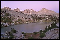 Columbine Peak and Palissades above lake at dusk, Lower Dusy basin. Kings Canyon National Park, California, USA.