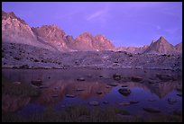 Mt Agasiz, Mt Thunderbolt, and Isoceles Peak reflected in a lake in Dusy Basin, sunset. Kings Canyon  National Park, California, USA.