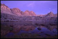 Mt Agasiz, Mt Thunderbolt, and Isoceles Peak reflected in a lake in Dusy Basin, sunset. Kings Canyon  National Park, California, USA.