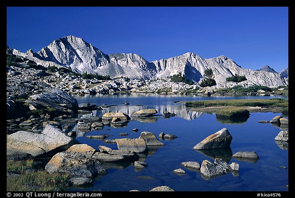 Mt Giraud reflected in a lake in Dusy Basin, morning. Kings Canyon  National Park, California, USA.