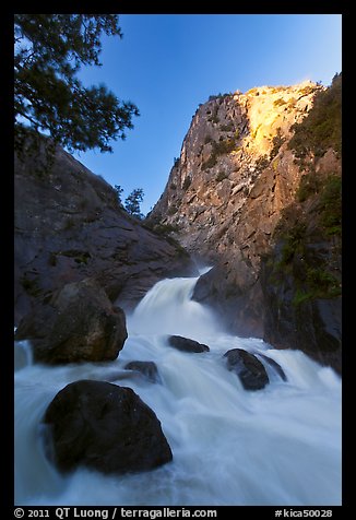 Roaring River Falls below high granite cliff. Kings Canyon National Park, California, USA.