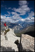 Hiker taking in view from Lookout Peak. Kings Canyon National Park, California, USA. (color)