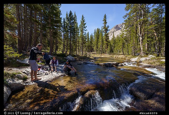Hikers washing at Bubbs Creek, Kings Canyon National Park. California (color)