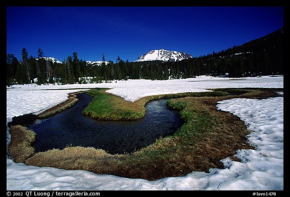 Stream in partly snow-covered Kings Creek meadows, morning. Lassen Volcanic National Park, California, USA.