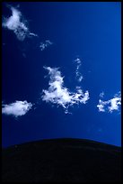 Clouds and round cinder cone. Lassen Volcanic National Park, California, USA.