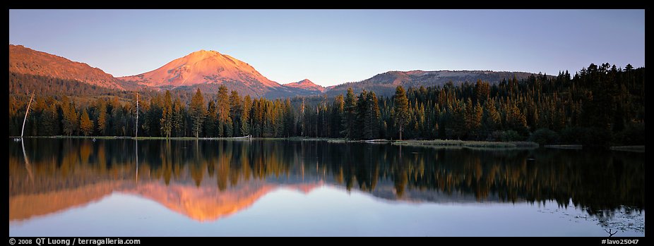 Lassen Peak reflected in Manzanita lake at sunset. Lassen Volcanic National Park, California, USA.