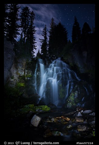 Dimly lit Kings Creek Falls and sky at night. Lassen Volcanic National Park, California, USA.