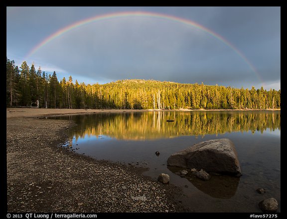 Rainbow in dark sky above Juniper Lake. Lassen Volcanic National Park (color)