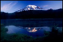 Mt Rainier reflected in Reflection lake at sunrise. Mount Rainier National Park, Washington, USA.