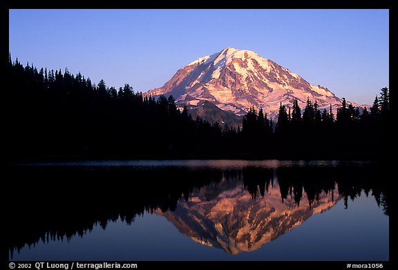 Mt Rainier with perfect reflection in Eunice Lake at sunset. Mount Rainier National Park, Washington, USA.