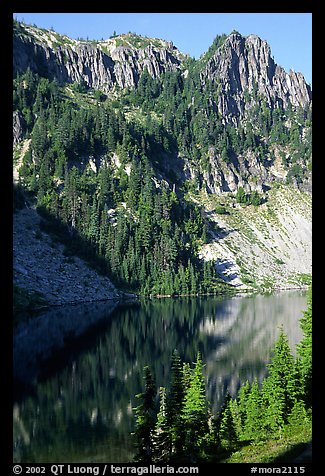 Cliffs reflected in Eunice Lake. Mount Rainier National Park, Washington, USA.