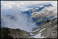 Mountains and clouds above South Fork of Cascade River, North Cascades National Park. Washington, USA.