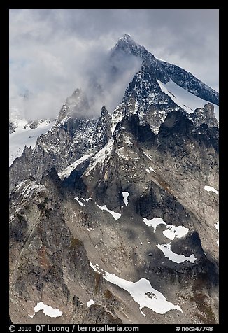 Cloud-shrouded Eldorado Peak, North Cascades National Park.  (color)
