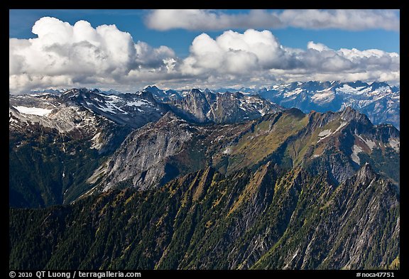 Mountains and afternoon cumulus clouds, North Cascades National Park.  (color)