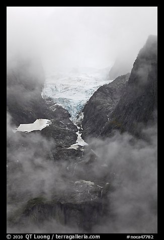 Hanging glacier in fog, North Cascades National Park.  (color)
