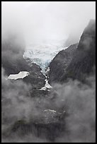 Hanging glacier in fog, North Cascades National Park. Washington, USA.