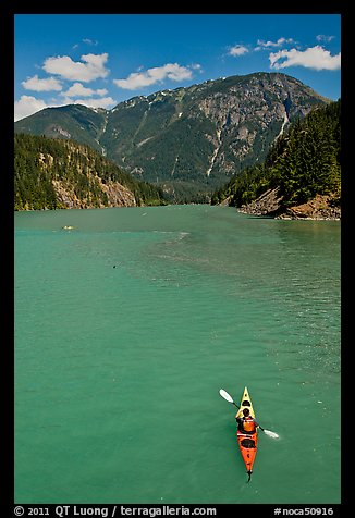 Kayaker on Diablo Lake,  North Cascades National Park Service Complex. Washington, USA.
