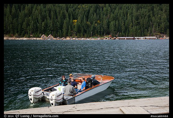 Boat ride across lake to Ross Lake resort, North Cascades National Park Service Complex.  (color)