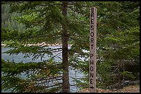 Sign pointing to phone used to call Ross Lake resort, North Cascades National Park Service Complex.  ( color)