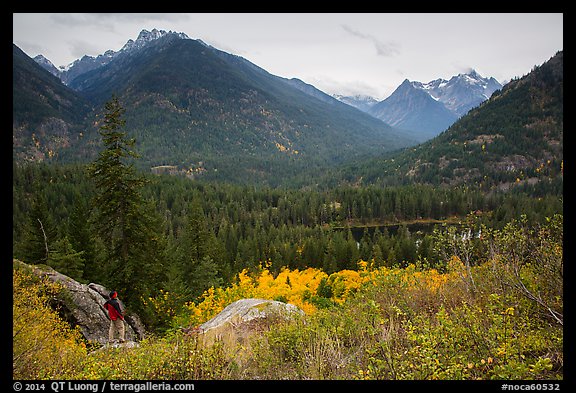 Visitor looking, McGregor Mountain above Coon Lake, North Cascades National Park Service Complex. Washington, USA.