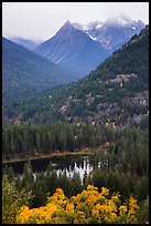 Coon Lake and Agnes peak in autumn, North Cascades National Park Service Complex. Washington, USA.