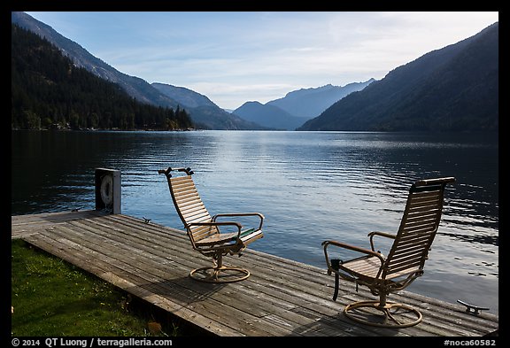 Two chairs and a buoy on deck, Lake Chelan, Stehekin, North Cascades National Park Service Complex. Washington, USA.
