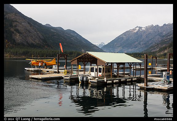 Fuel pump, boat, and floatplane, Stehekin, North Cascades National Park Service Complex.  (color)