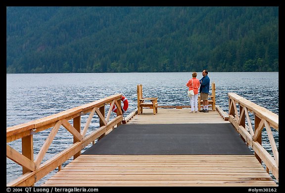 Couple on Pier, Crescent Lake. Olympic National Park (color)