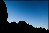 Rocky ridge and stars at twilight. Pinnacles National Park, California, USA. (color)
