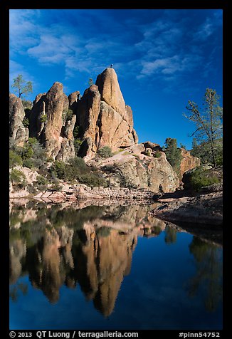 Climber standing on spire next to Bear Gulch Reservoir. Pinnacles National Park (color)