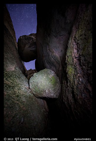 Boulders wedged in Balconies Cave at night. Pinnacles National Park (color)