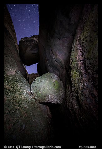 Boulders wedged in Balconies Cave at night. Pinnacles National Park, California, USA.