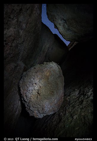 Boulder in Balconies talus cave at night. Pinnacles National Park, California, USA.