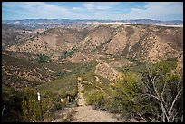 Steep hill and pig exclusion fence. Pinnacles National Park, California, USA. (color)