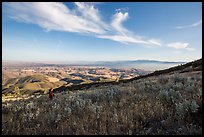 Park visitor looking, South Chalone Peak. Pinnacles National Park, California, USA. (color)