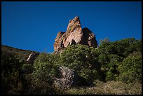 Pinnacle and stars on full moon night. Pinnacles National Park, California, USA.