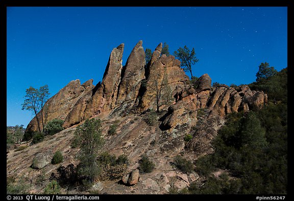 Rock pinnacles by lit by full moon. Pinnacles National Park, California, USA.