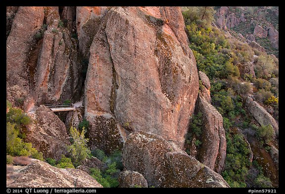 Footbridge dwarfed by rock pinnacles. Pinnacles National Park (color)