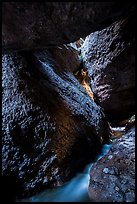 Stream and boulders, Upper Bear Gulch cave. Pinnacles National Park ( color)
