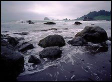 Sand, boulders and surf, Hidden Beach. Redwood National Park, California, USA.