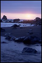 Stream on beach at sunset, False Klamath cove. Redwood National Park, California, USA.