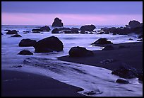 Stream, rocks, and ocean at dusk, False Klamath cove. Redwood National Park, California, USA. (color)