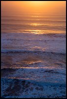 Waves lit by setting sun from above. Redwood National Park, California, USA.