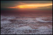 Elevated view of waves and sunset. Redwood National Park, California, USA.