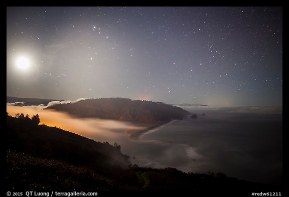 Mouth of Klamath River and moon at night. Redwood National Park, California, USA.