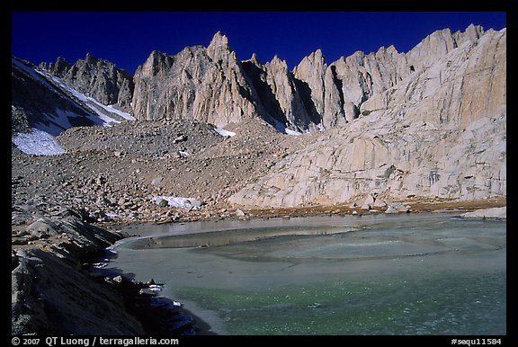 Frozen Trail Camp Pond and Mt Whitney chain. Sequoia National Park, California, USA.