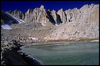 Frozen Trail Camp Pond and Mt Whitney chain. Sequoia National Park, California, USA.