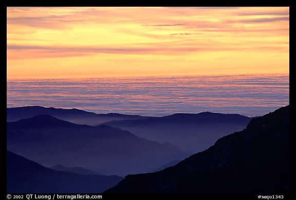 Receding lines of  foothills and sea of clouds at sunset. Sequoia National Park, California, USA.